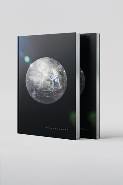 View of Arquivistas book front cover and silver guilded pages . Published by Art & Anthropology Press. Author, Tatiana Dorow. 