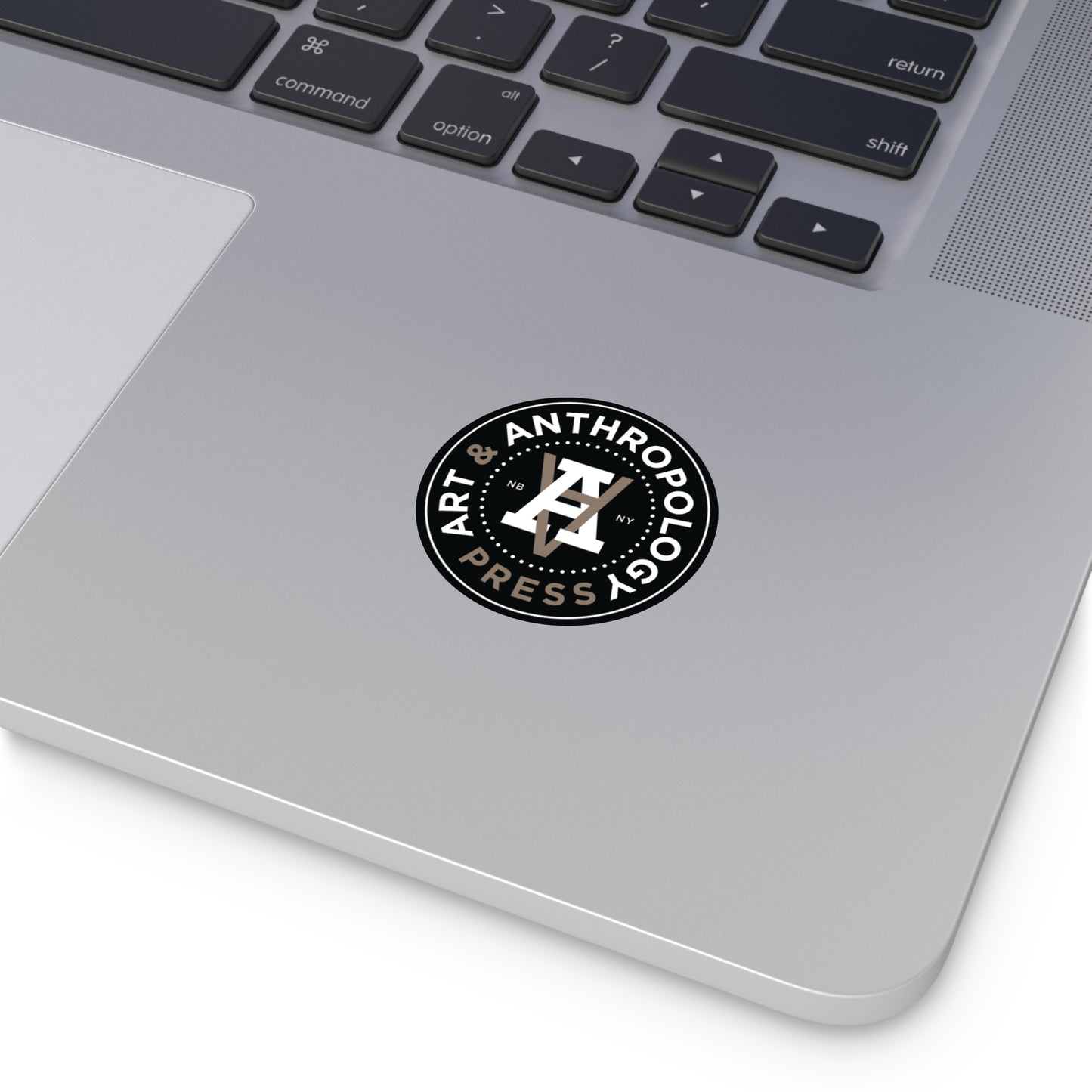 2" Art & Anthropology Press vinyl sticker example on a laptop for scale. 
