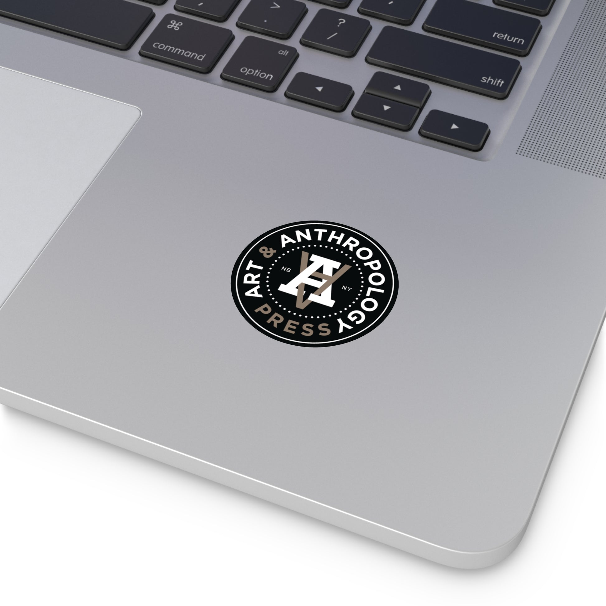 2" Art & Anthropology Press vinyl sticker example on a laptop for scale. 
