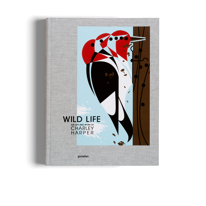 Book titled 'Wild Life: The Life and Work of Charley Harper' with a woodpecker illustration on a gray background
